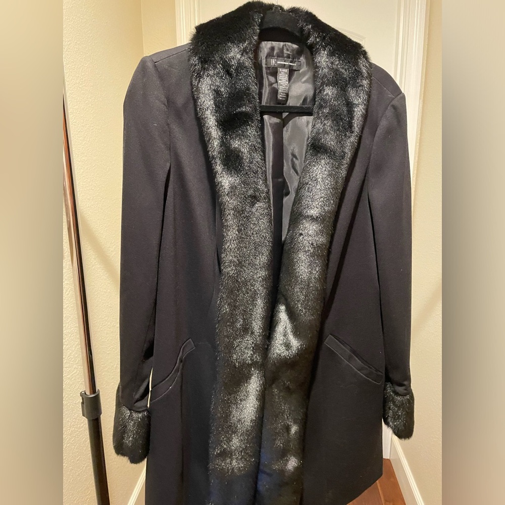 Mid length fitted black coat with fur trim. Gorgeous! Size L